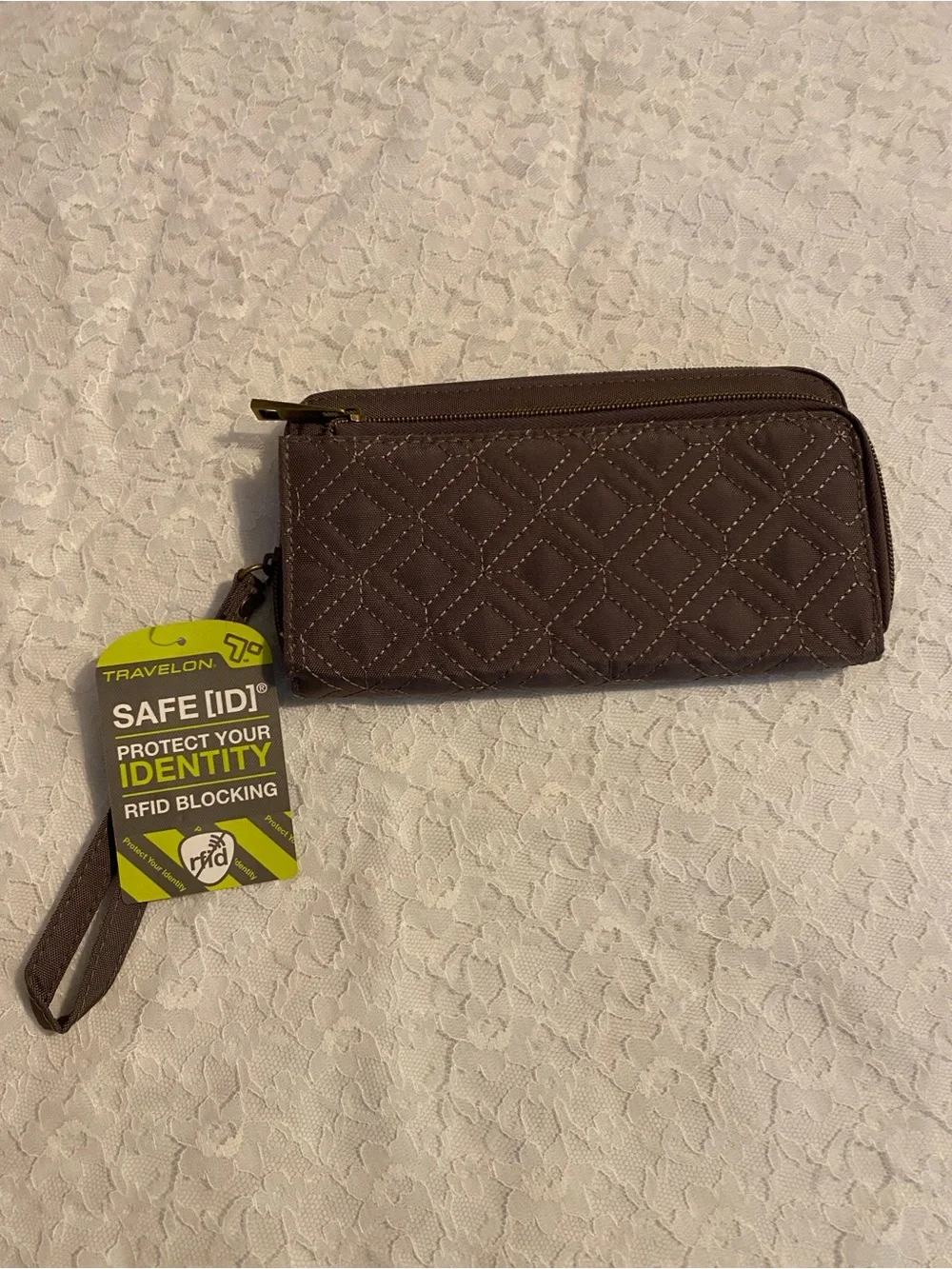 Travelon quilted Wristlet Wallet -RFID blocking to protect cards and ID.